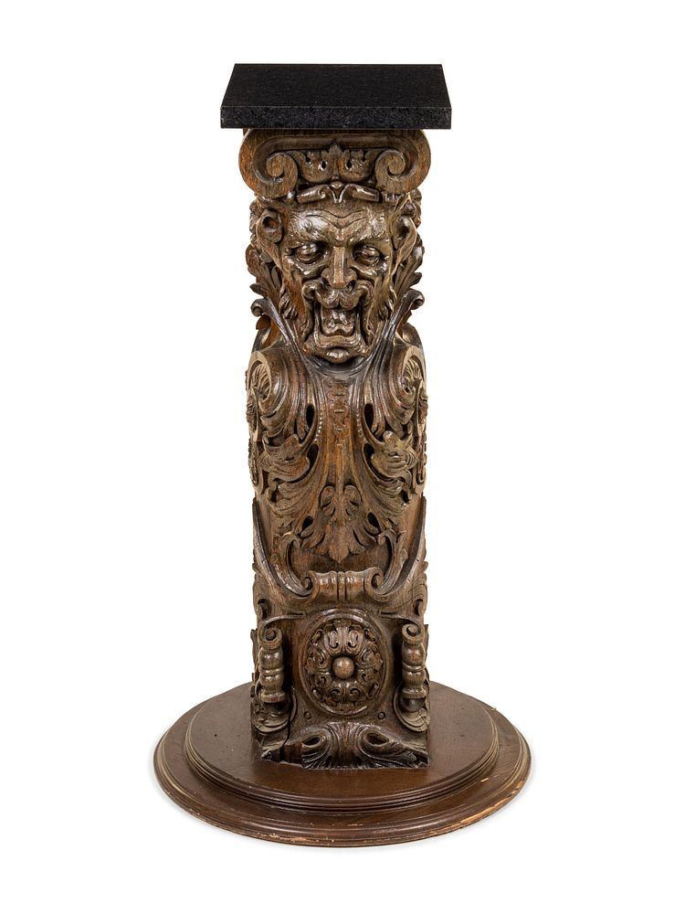 Appraisal: A Continental Carved Oak Pedestal A Continental Carved Oak Pedestal