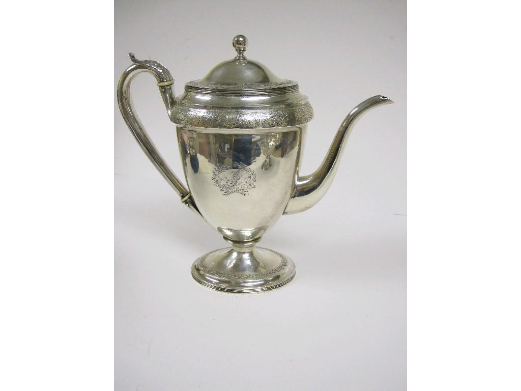 Appraisal: A George III oval Coffee Pot with floral and leafage