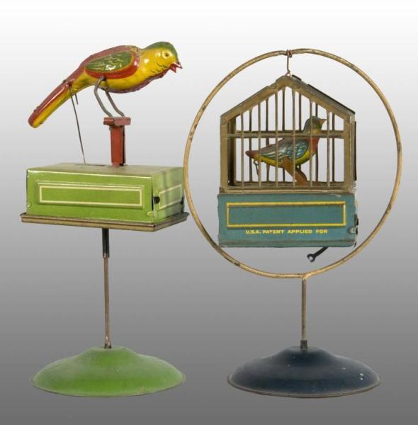 Appraisal: Lot of Tin Litho Birdcage Wind-Up Toys Description German Toy