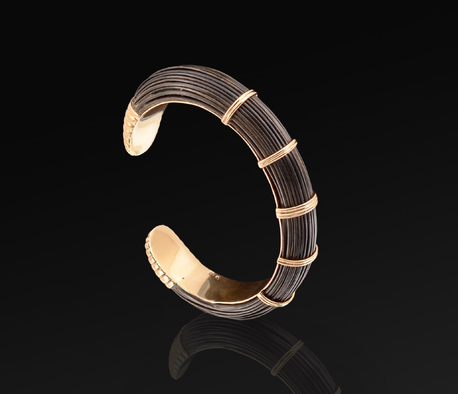 Appraisal: K ELEPHANT HAIR FLEX CUFF BRACELET This unique signed and