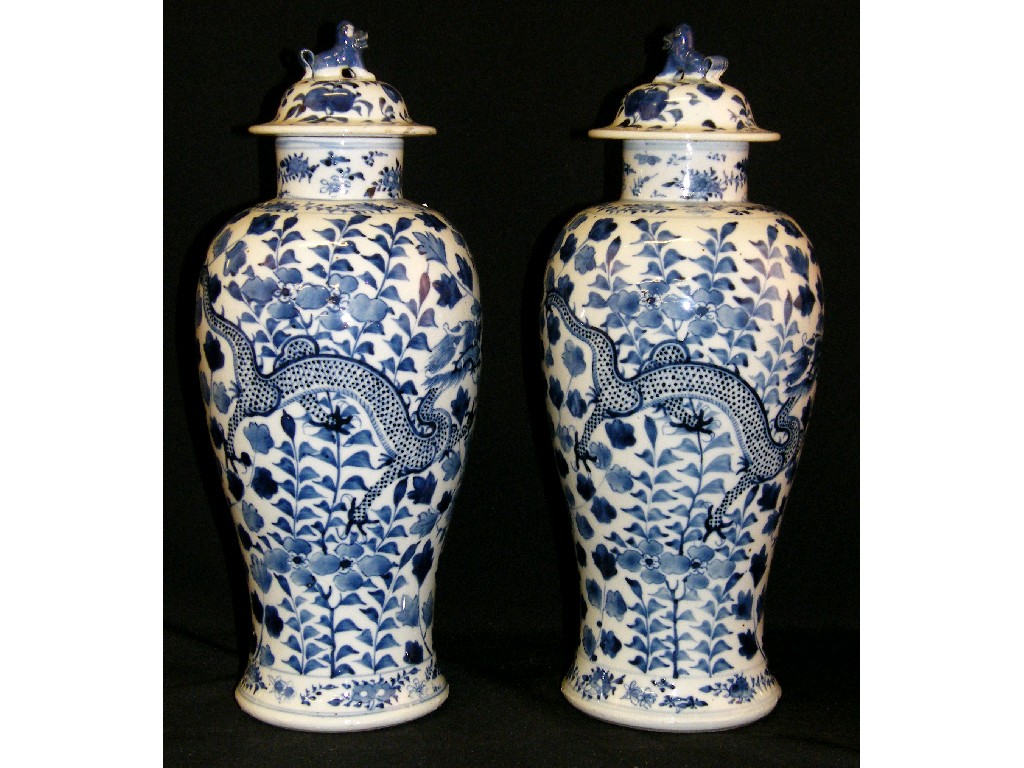 Appraisal: Pair of Chinese baluster vases and covers decorated with two