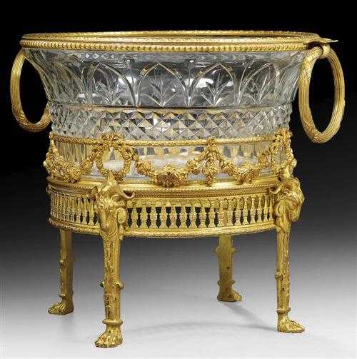 Appraisal: CUT GLASS BOWL WITH GILT BRONZE MOUNT AUX TETES DE