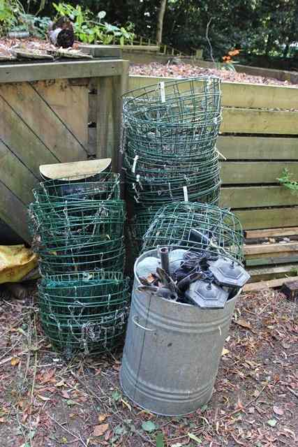 Appraisal: A LARGE QUANTITY OF HANGING BASKETS together with a quantity