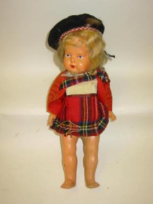 Appraisal: A Kathe Kruse type composition doll with painted face blonde