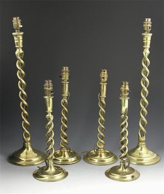 Appraisal: A pair of brass open spiral twist table lamps in