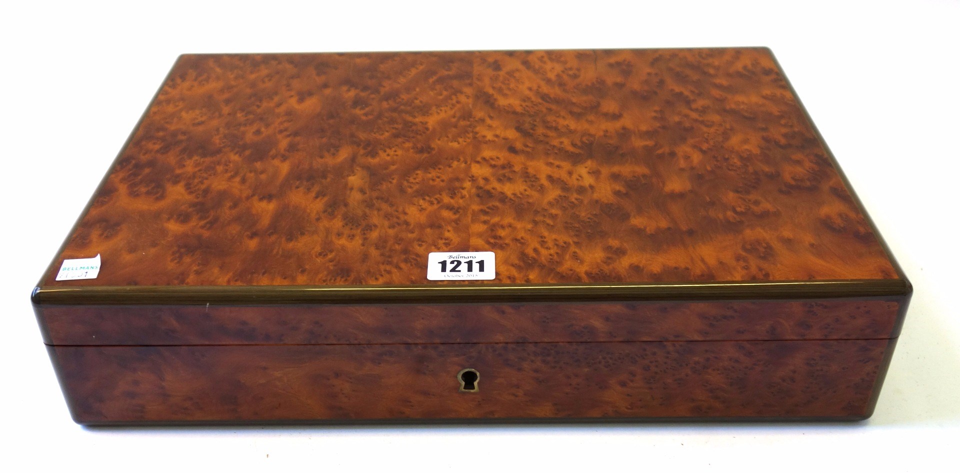 Appraisal: A th century Dunhill amboyna humidor with inlaid rounded corners