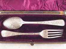 Appraisal: A boxed matched silver spoon and fork presentation set with