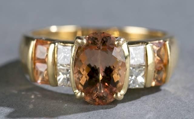 Appraisal: ct golden topaz diamond and kt gold ring A ct