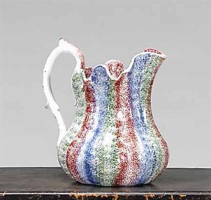 Appraisal: Staffordshire rainbow spatterware pitcher circa Of lobed form with scalloped