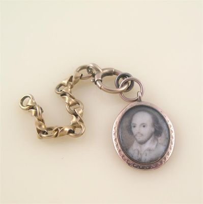 Appraisal: A glazed gold oval shaped locket containing a miniature portrait