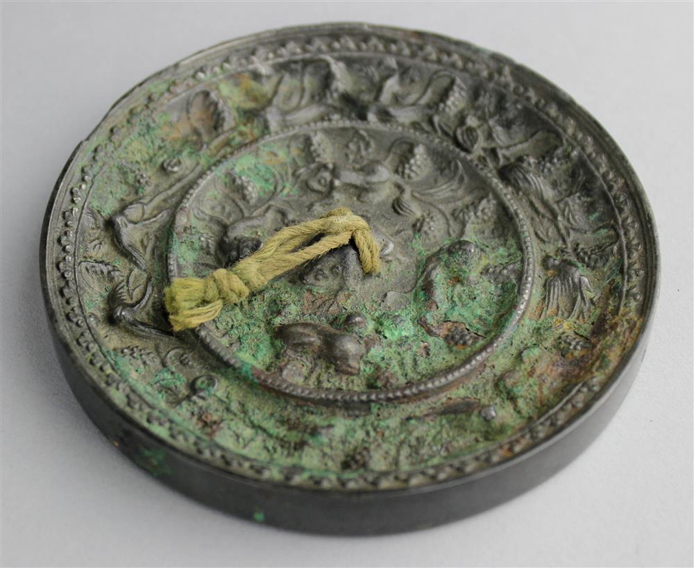 Appraisal: CHINESE SILVERED BRONZE MIRROR TANG DYNASTY central circular frog enclosed