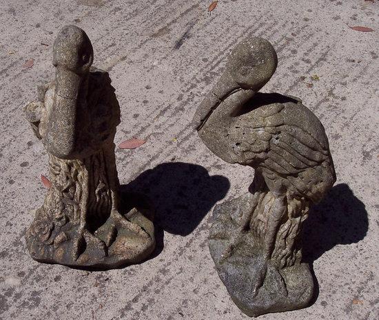 Appraisal: A pair of reconstituted stone pelicans cm high