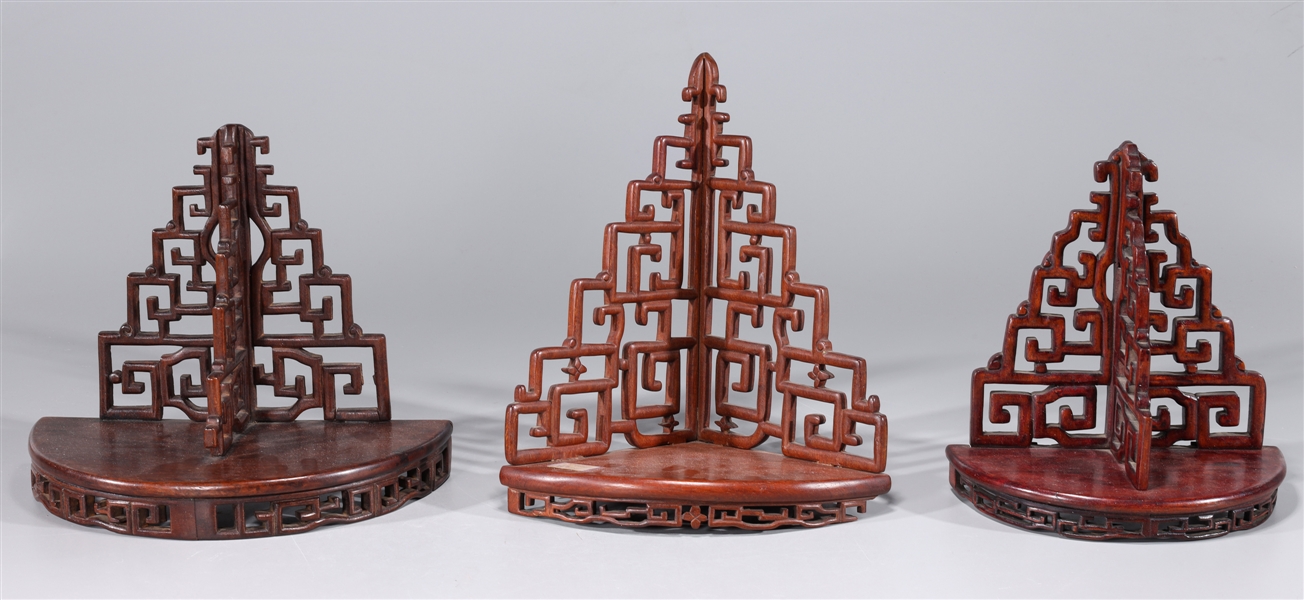 Appraisal: Three elaborate Chinese wooden wall shelves some nicks to wood