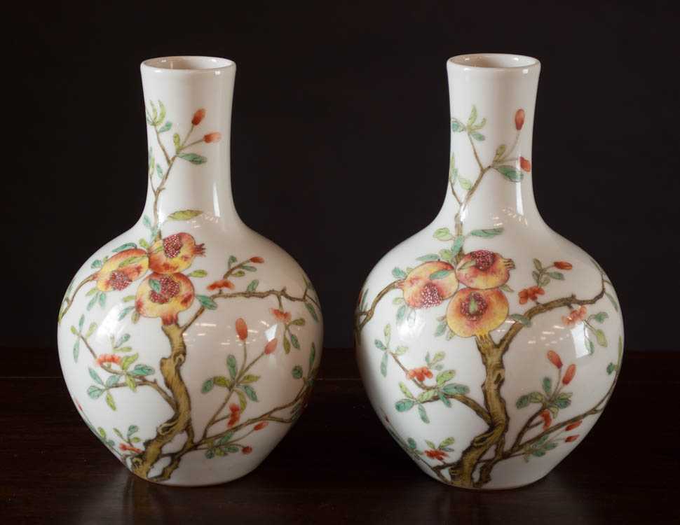 Appraisal: PAIR CHINESE QING PORCELAIN VASES in bottle form with branches