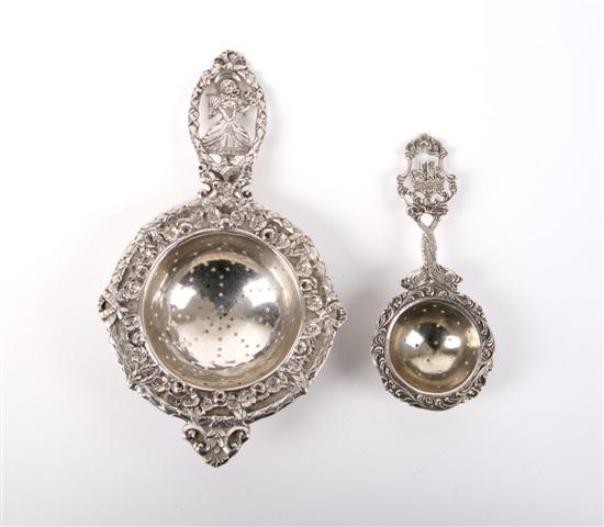 Appraisal: Two German Silver Tea Strainers Length of longest inches