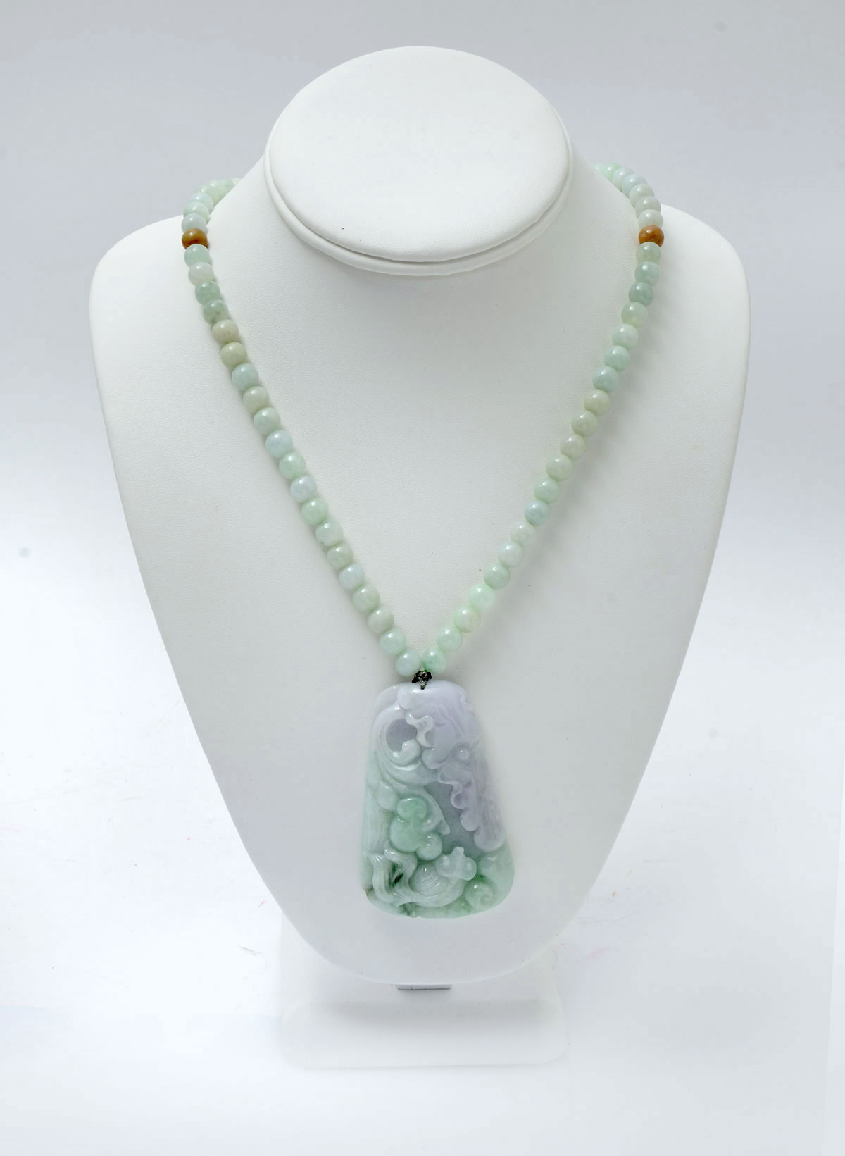 Appraisal: JADE NECKLACE PENDANT Pendant is light purple and green in