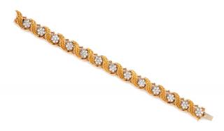 Appraisal: A Bicolor Gold and Diamond Bracelet Jabel dwts A Bicolor