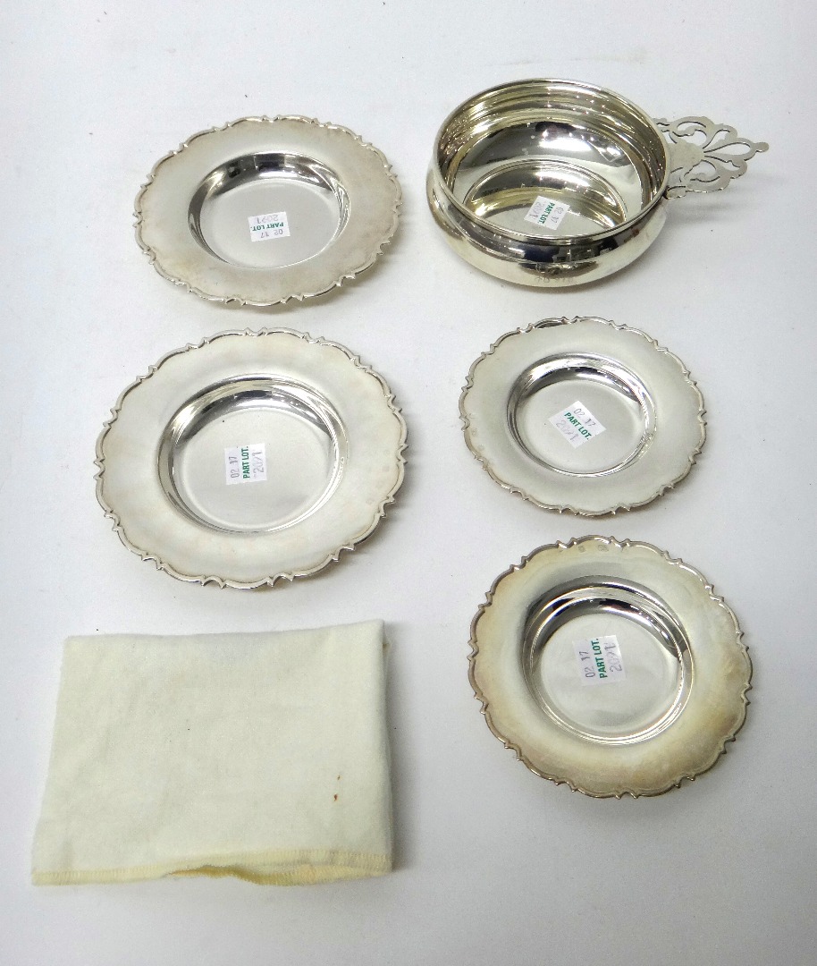 Appraisal: A pair of silver circular dishes having shaped rims a