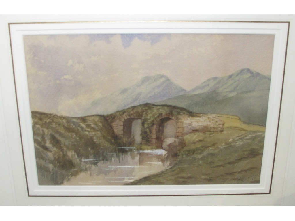 Appraisal: B CARMICHAEL Watercolour highland landscape with a bridge signed and