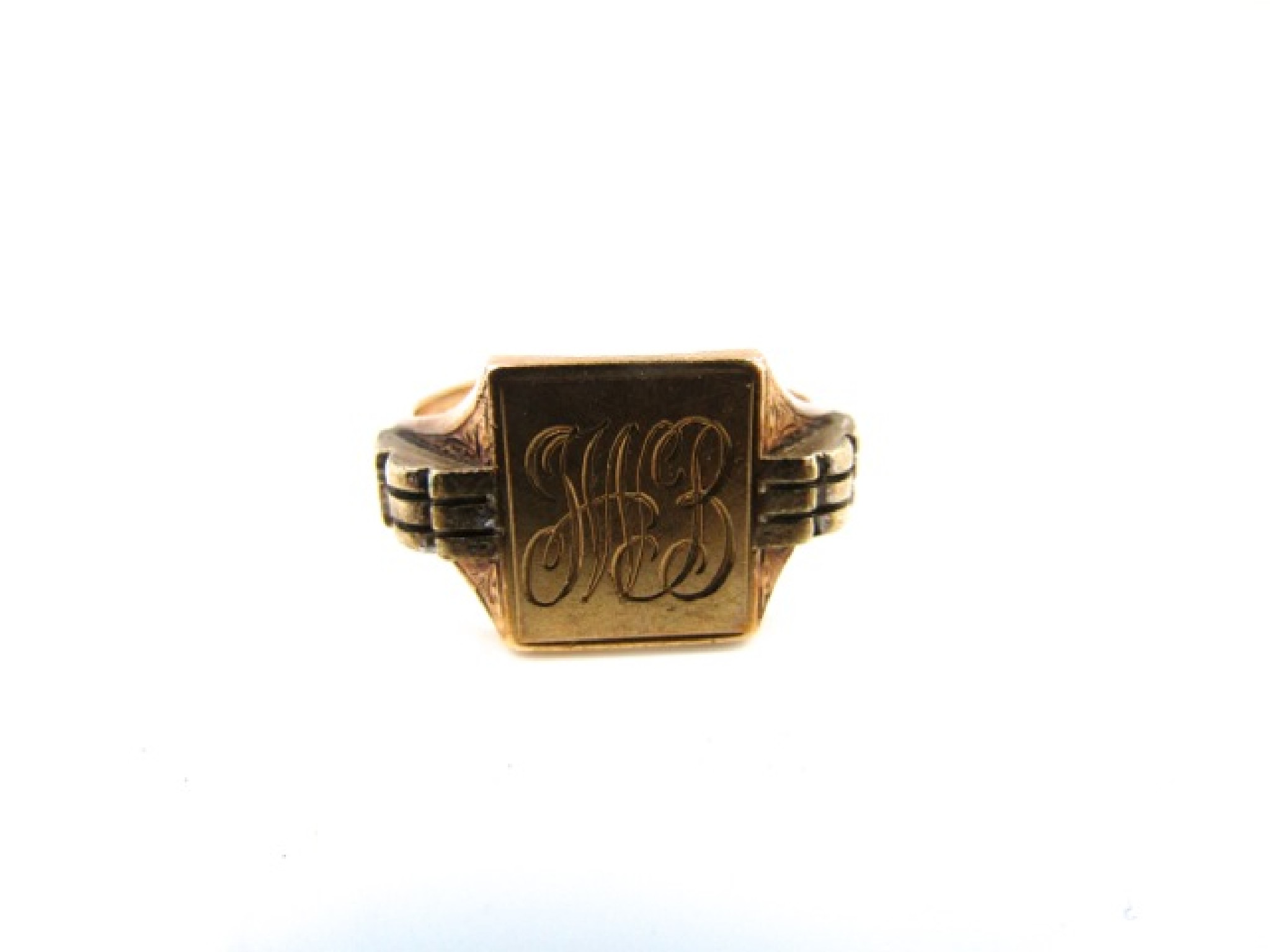 Appraisal: A ct gold signet ring with shaped shoulders and monogram