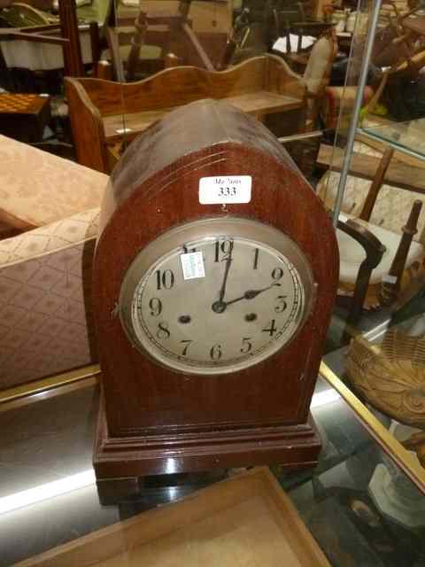 Appraisal: AN EARLY TH CENTURY STRIKING MANTEL CLOCK the arched topped