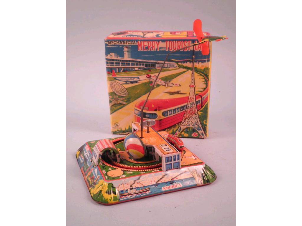 Appraisal: A Japanese clockwork toy Merry Tourist Land showing air terminal