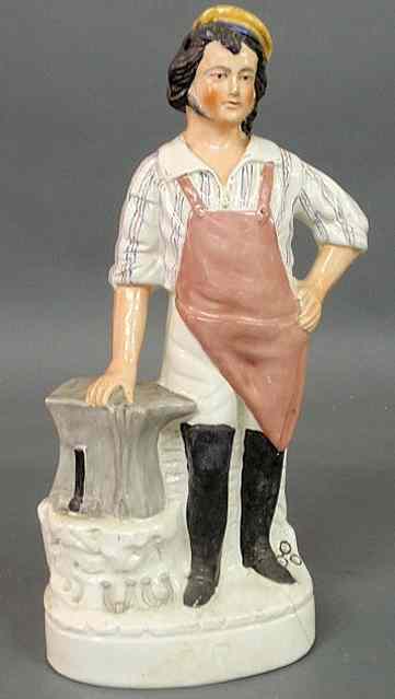 Appraisal: Large th c Staffordshire figure of a blacksmith with anvil