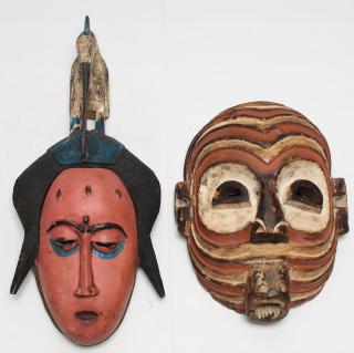 Appraisal: Vintage African Carved Painted Tribal Masks A striped West African