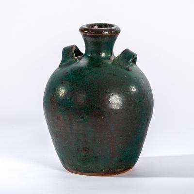 Appraisal: Trevor Corser British - for Leach Pottery a green vase