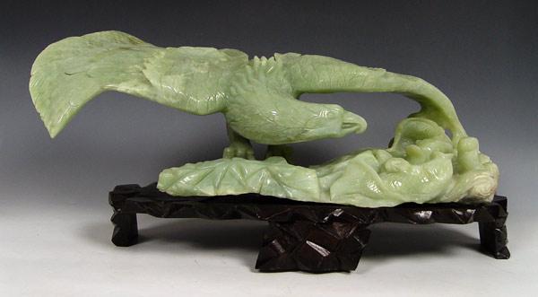 Appraisal: LARGE CHINESE CARVED SERPENTINE EAGLE FIGURAL GROUP Eagle in flight