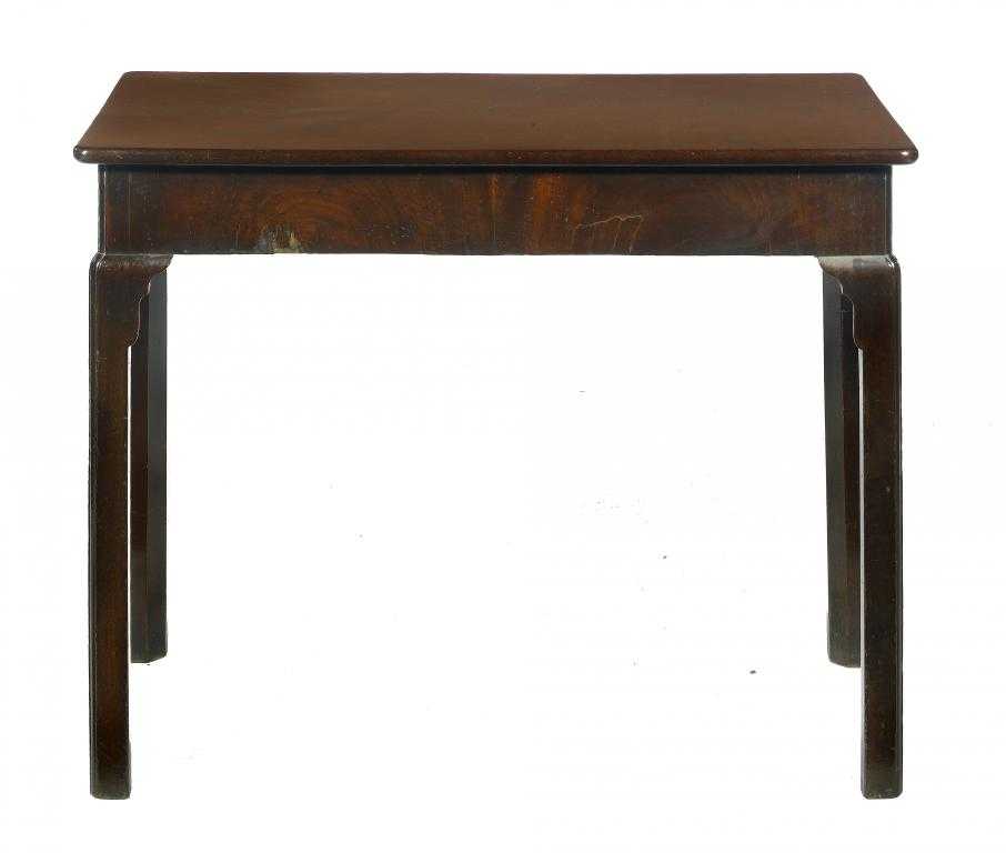 Appraisal: A GEORGE III MAHOGANY TABLE with projecting oblong top and