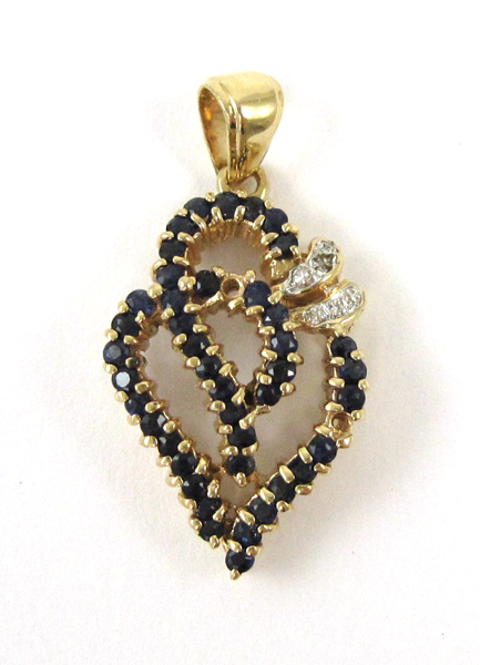 Appraisal: SAPPHIRE AND FOURTEEN KARAT GOLD PENDANT set with six round-cut