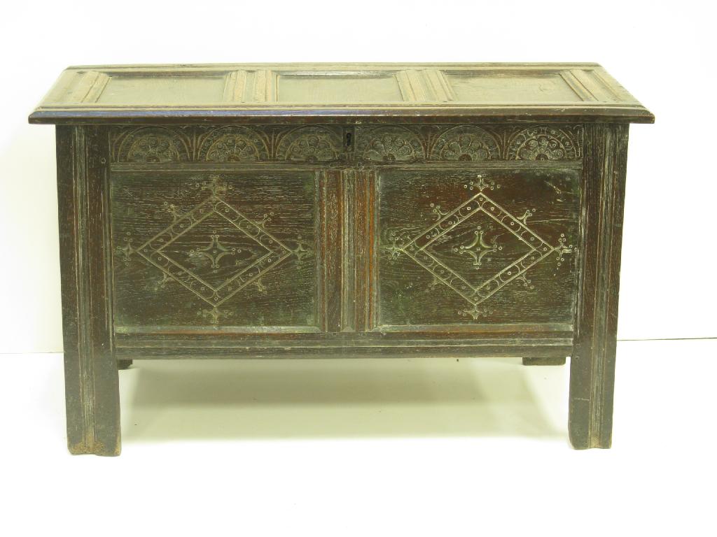 Appraisal: An th Century oak Coffer with carved diamond pattern to