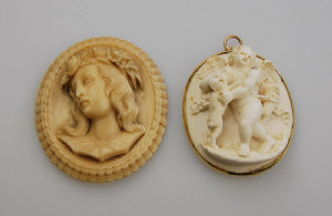 Appraisal: Cameo brooch and pendant one finely carved ivory in high