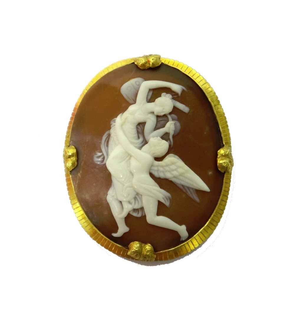 Appraisal: A gold mounted oval shell cameo brooch carved as classical