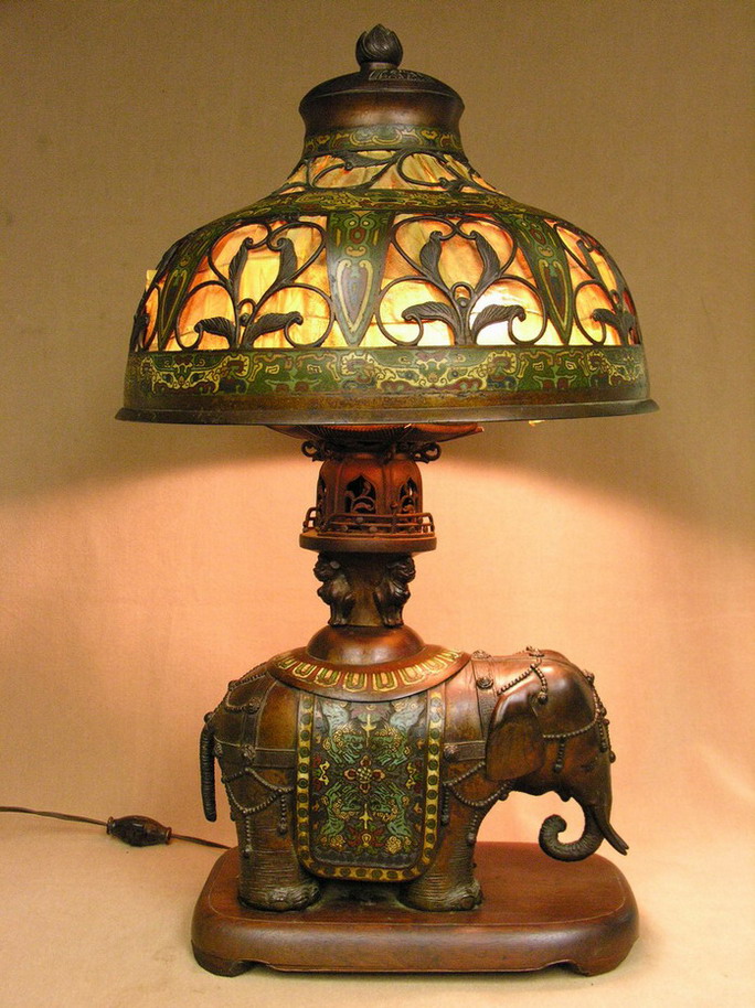 Appraisal: BRONZE CLOISONNE ELEPHANT LAMP cloisonne shade has original fabric that