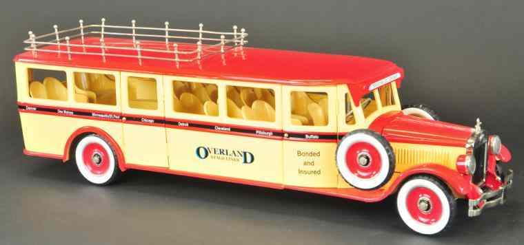 Appraisal: RETRO COMPANY OVERLAND STAGE LINE BUS Contemporary pressed steel toy