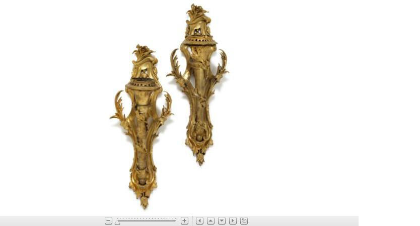 Appraisal: Pair of Louis XVI style gilt metal wall sconces The