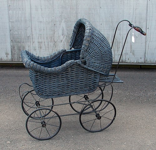 Appraisal: Carriage Black wicker doll carriage with adjustable hood black metal