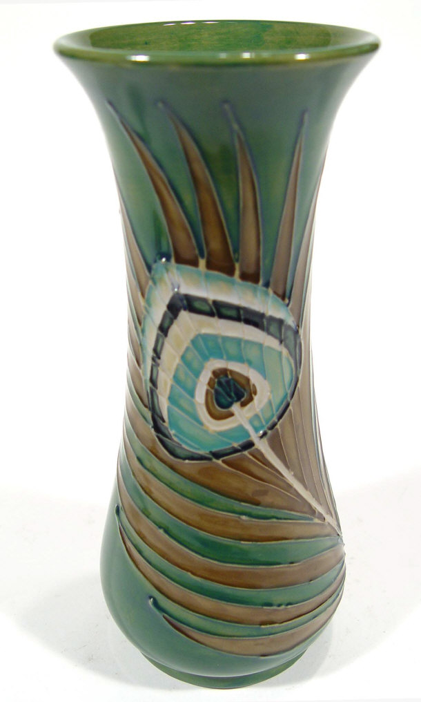 Appraisal: Moorcroft pottery vase hand painted and tubelined with peacock feathers