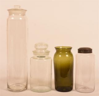 Appraisal: Four Various Blown Glass Canisters One emerald green glass -