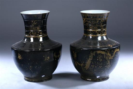 Appraisal: PAIR LARGE CHINESE GILT MIRROR BLACK VASES Kangxi period Shield-form