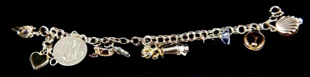 Appraisal: LADY'S YELLOW GOLD CHARM BRACELET