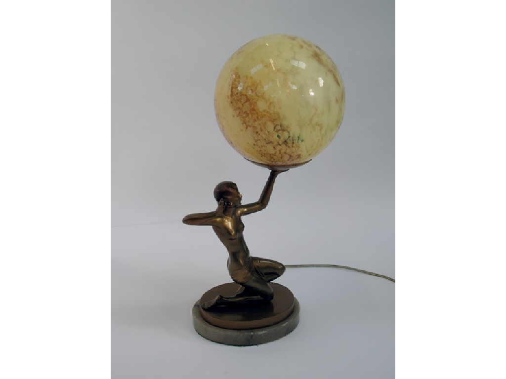 Appraisal: AN ART DECO GILT AND PATINATED METAL TABLE LAMP in