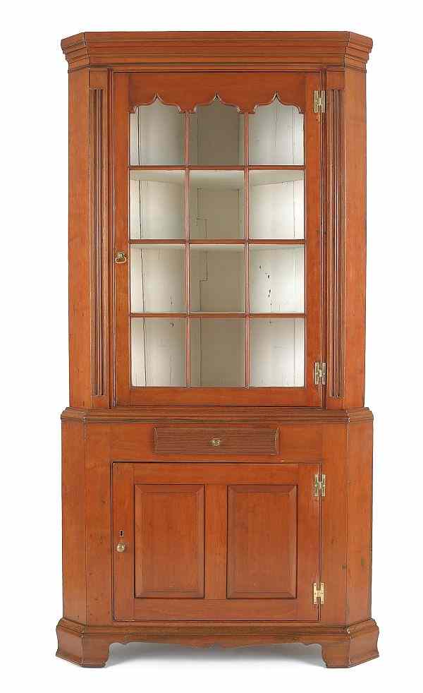 Appraisal: Pennsylvania Federal cherry corner cupboard ca in two parts the