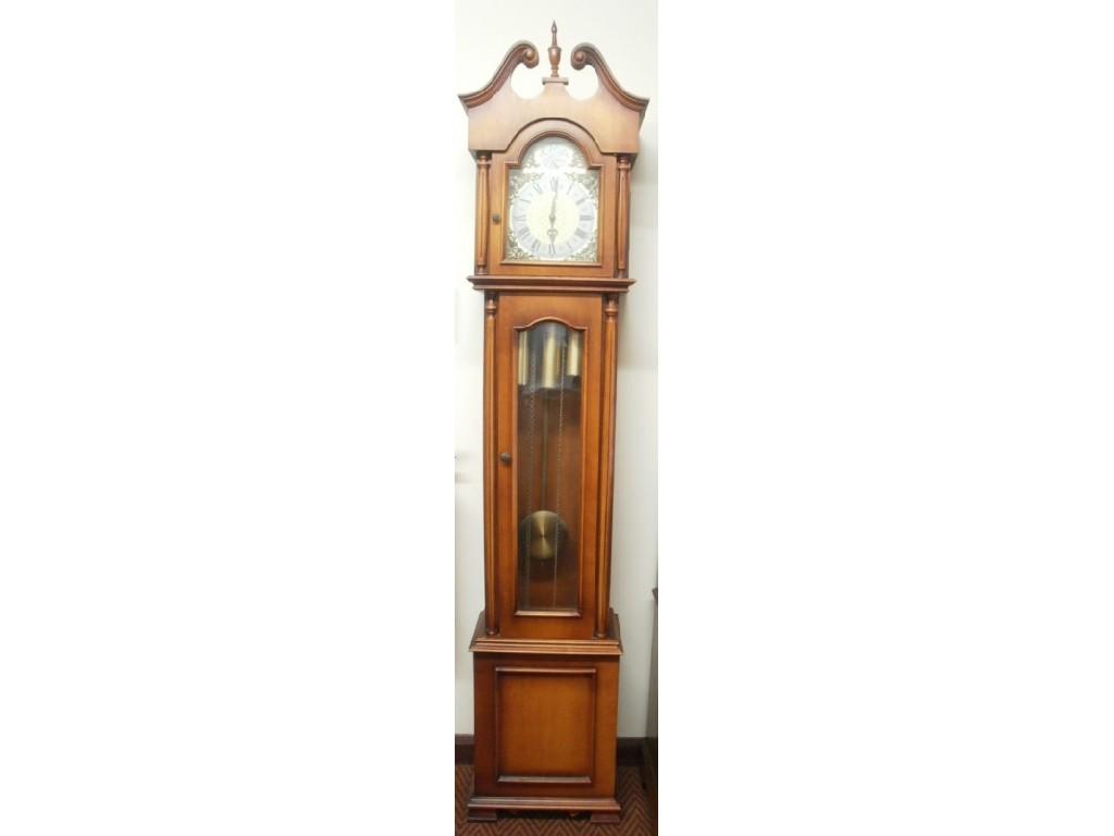 Appraisal: A long case clock with striking and chiming eight day