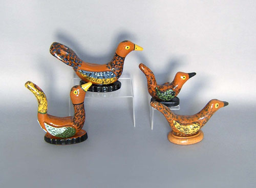 Appraisal: Four redware bird whistles by Seagreaves tallest - h Provenance