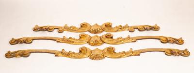 Appraisal: A set of three carved giltwood window pelmets with centre