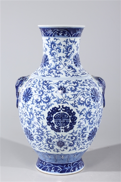 Appraisal: Chinese blue and white porcelain vase with molded mask handles