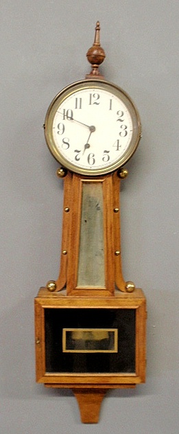 Appraisal: - Mahogany presentation banjo clock by Ingraham with black reverse